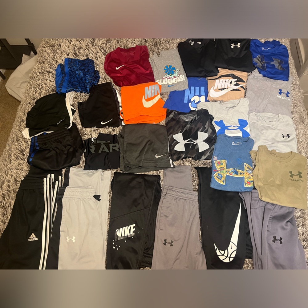 Boys size medium Nike and Under Armour lot